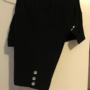 Ninety woman size 20W black ankle length pants with embellishment at ankles.